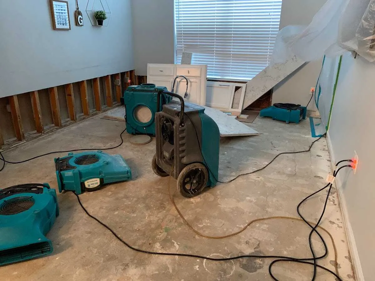 Dehumidifier in flood-cut room for Water Damage Restoration in Eaton